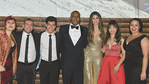 Robert F. Smith and wife, Hope Dworaczyk Smith posing with members of the Sphinx Organization