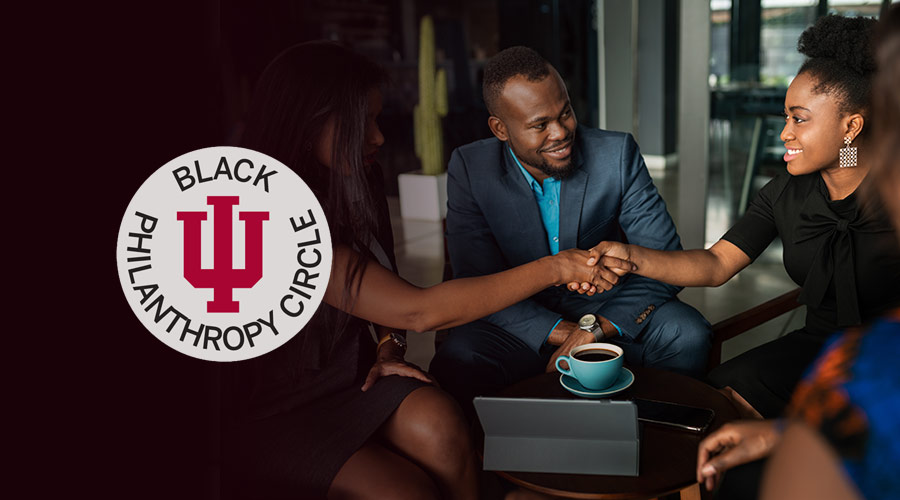 Three Black adults gather and shake hands, with a Black Philanthropy Circle at Indiana University graphic to the left