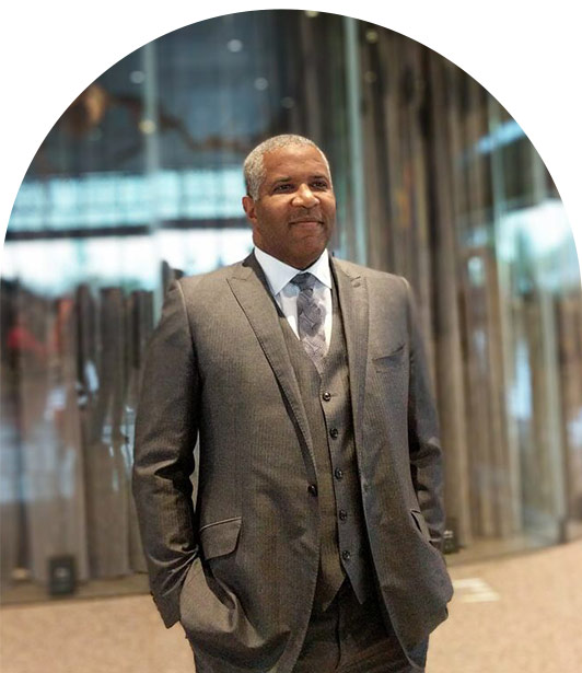 Robert F. Smith standing outside of the Robert Frederick Smith Family Pavilion at the National Museum of African American History and Culture