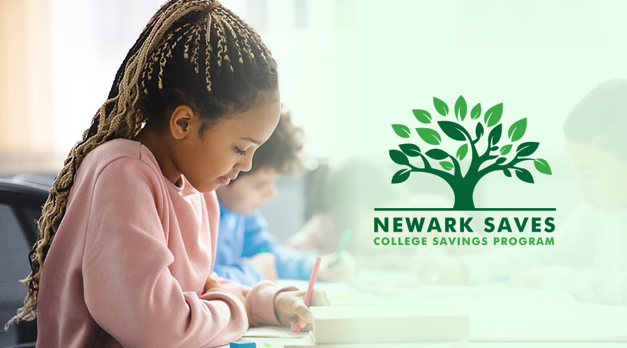 A little girl with long braided hair in a ponytail, wearing a pink sweatshirt, sits at a desk writing with a pen, with the Newark Saves College Savings Program logo on the right.